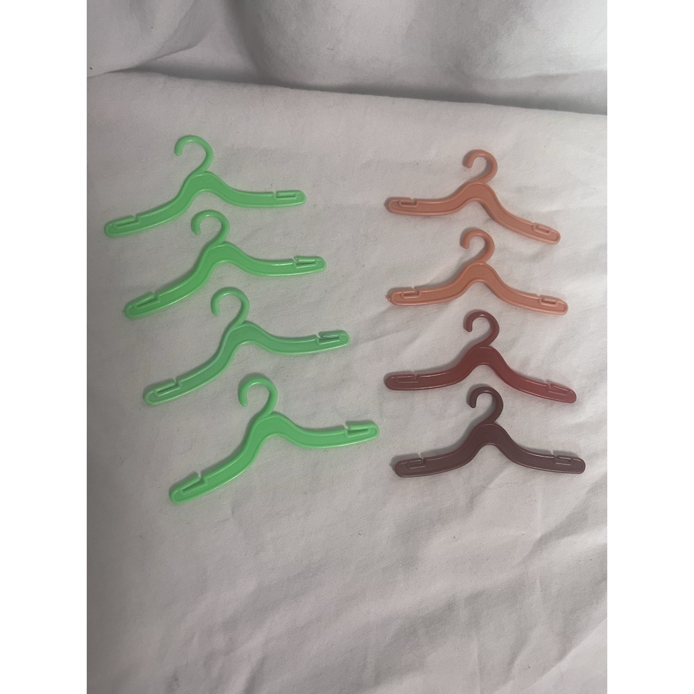 Vintage Barbie 1960s clothes hangers lot green red brown Hong Kong set of 8.